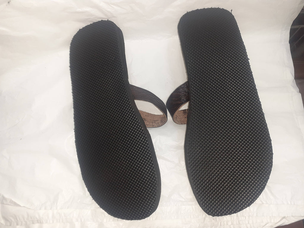 Sandalias de cuero.Marron oscuro